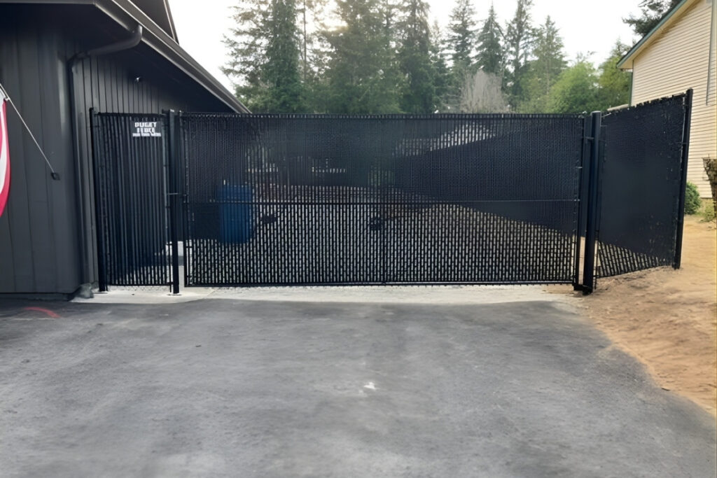 Why Pair A Chain Link Fence With An Electric Driveway Gate?