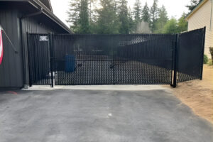 Chain Link Fence With An Electric Driveway Gate